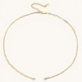 Nadare Co. 14k gold plated stainless steel small oval switch chain necklace with adjustable extension.
