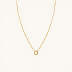Nadare Co. 14k gold plated stainless steel small oval switch chain necklace with a circular charm attachment point.