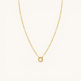 Nadare Co. 14k gold plated stainless steel small oval switch chain necklace with a circular charm attachment point.