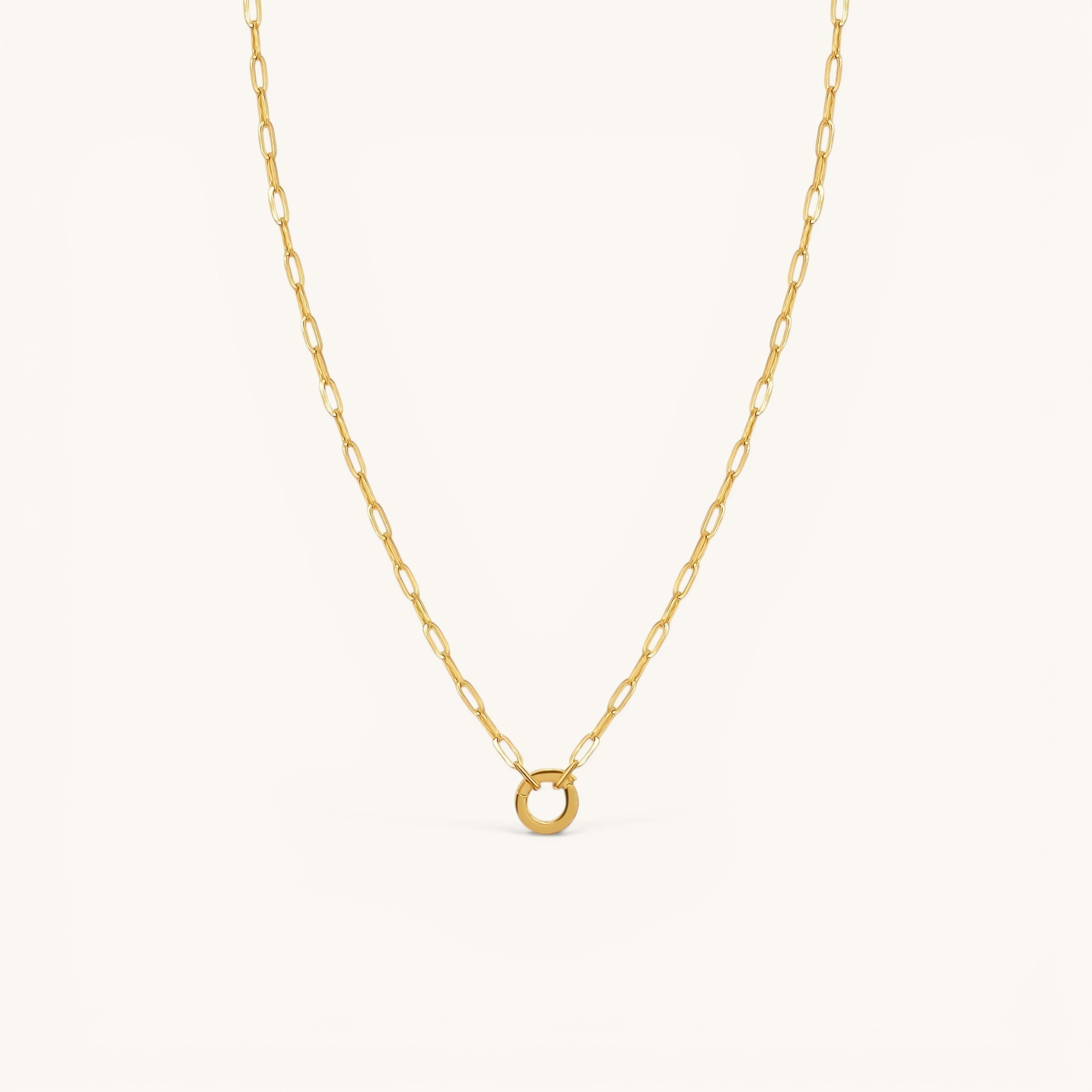 Nadare Co. 14k gold plated stainless steel small oval switch chain necklace with a circular charm attachment point.