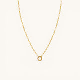 Nadare Co. 14k gold plated stainless steel small oval switch chain necklace with a circular charm attachment point.