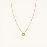 Nadare Co. 14k gold plated stainless steel small oval switch chain necklace with a circular charm attachment point.