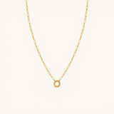Nadare Co. 14k gold plated stainless steel small oval switch chain necklace with a circular charm attachment point.