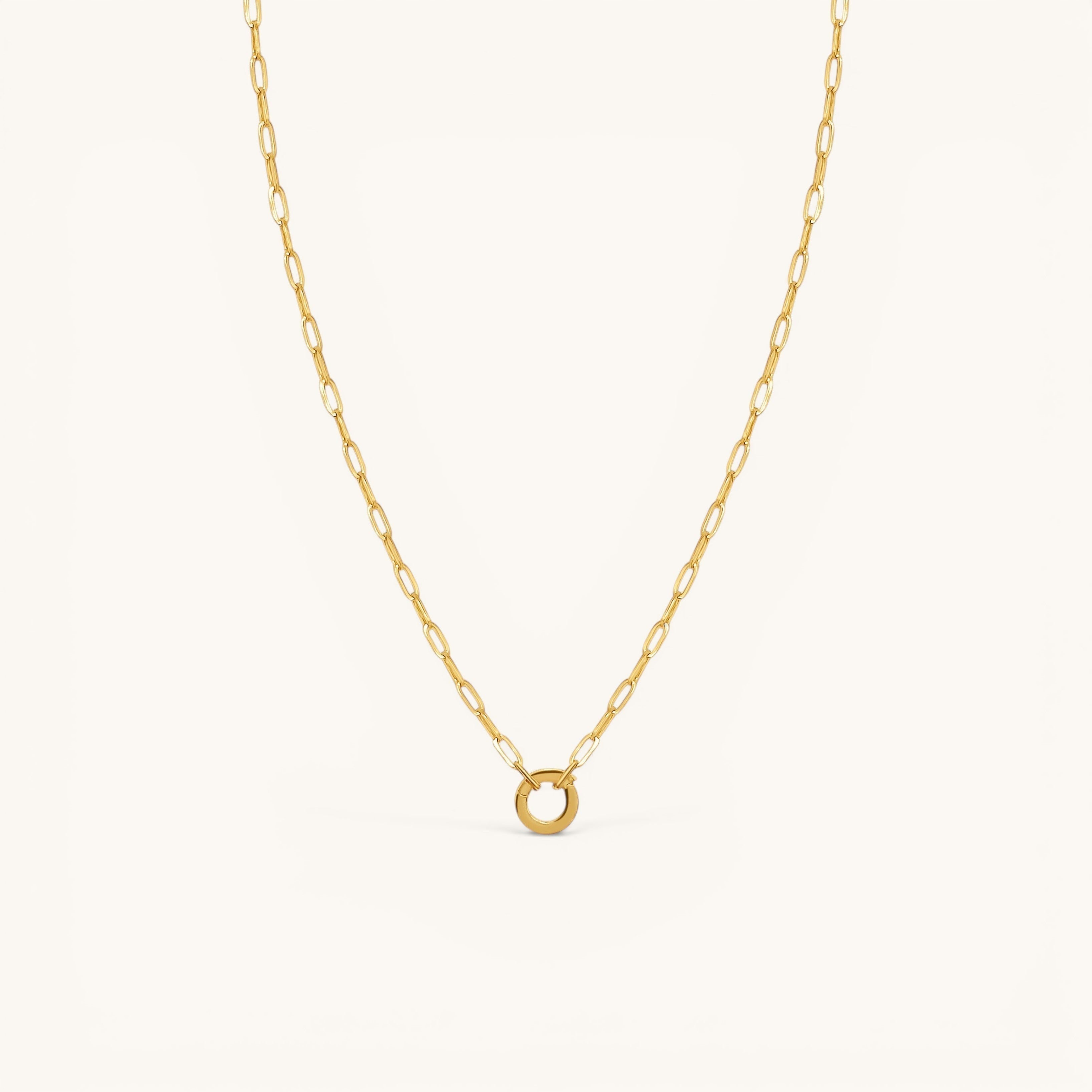 Nadare Co. 14k gold plated stainless steel small oval switch chain necklace with a circular charm attachment point.