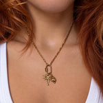 Nadare Co. large gold-plated stainless steel palm tree and seashell charms on a delicate link chain necklace