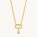 Nadare Co. mini gold padlock charm with cubic zirconia pavé stones on a chunky gold link chain necklace.