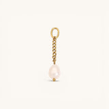 Nadare Co. gold chain charm featuring a single freshwater pearl with a classic switch clasp for vintage style.