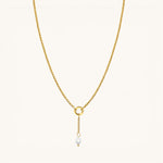 Nadare Co. gold plated stainless steel necklace featuring a delicate 1.5 cm chain with a genuine freshwater pearl charm.