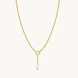 Nadare Co. gold plated stainless steel necklace featuring a delicate 1.5 cm chain with a genuine freshwater pearl charm.