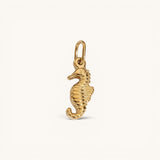 Nadare Co. gold-plated stainless steel seahorse charm with intricate coastal detailing for a charm necklace.