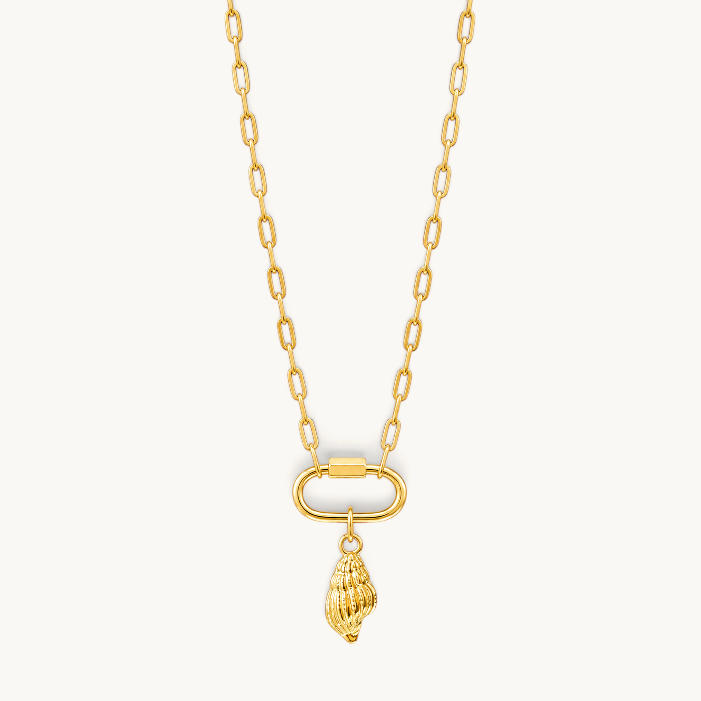 Nadare Co. gold spiral seashell charm pendant on a delicate link chain, crafted from 14k gold plated stainless steel.