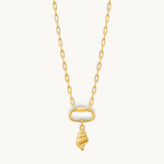 Nadare Co. gold spiral seashell charm pendant on a delicate link chain, crafted from 14k gold plated stainless steel.