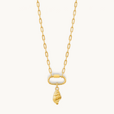 Nadare Co. gold spiral seashell charm pendant on a delicate link chain, crafted from 14k gold plated stainless steel.