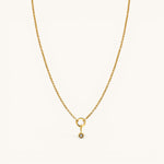 Nadare Co. gold chain necklace featuring a delicate star charm pendant with a small sparkling center stone.