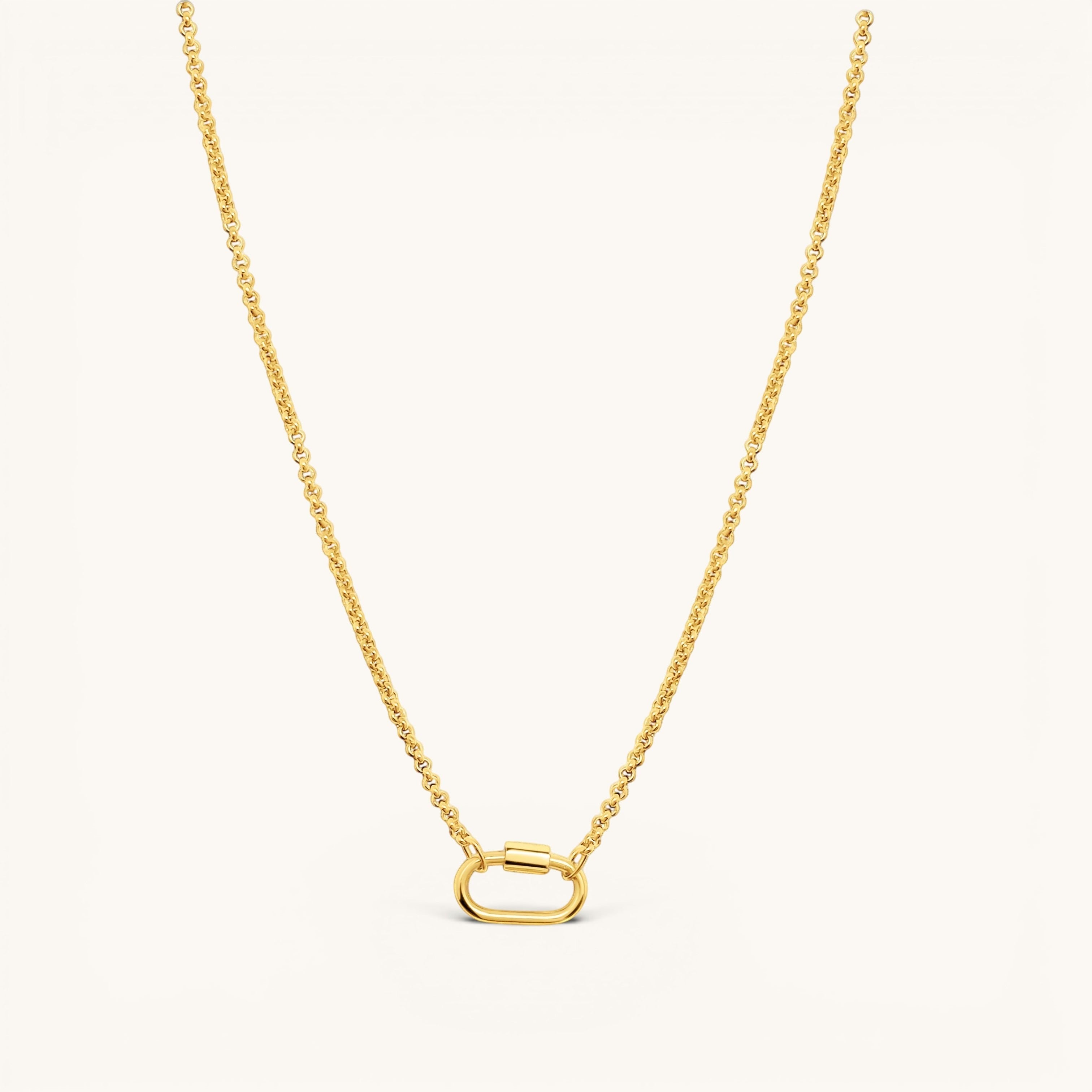 Nadare Co. gold plated stainless steel Classic Switch Chain necklace with a minimalist oval carabiner pendant.