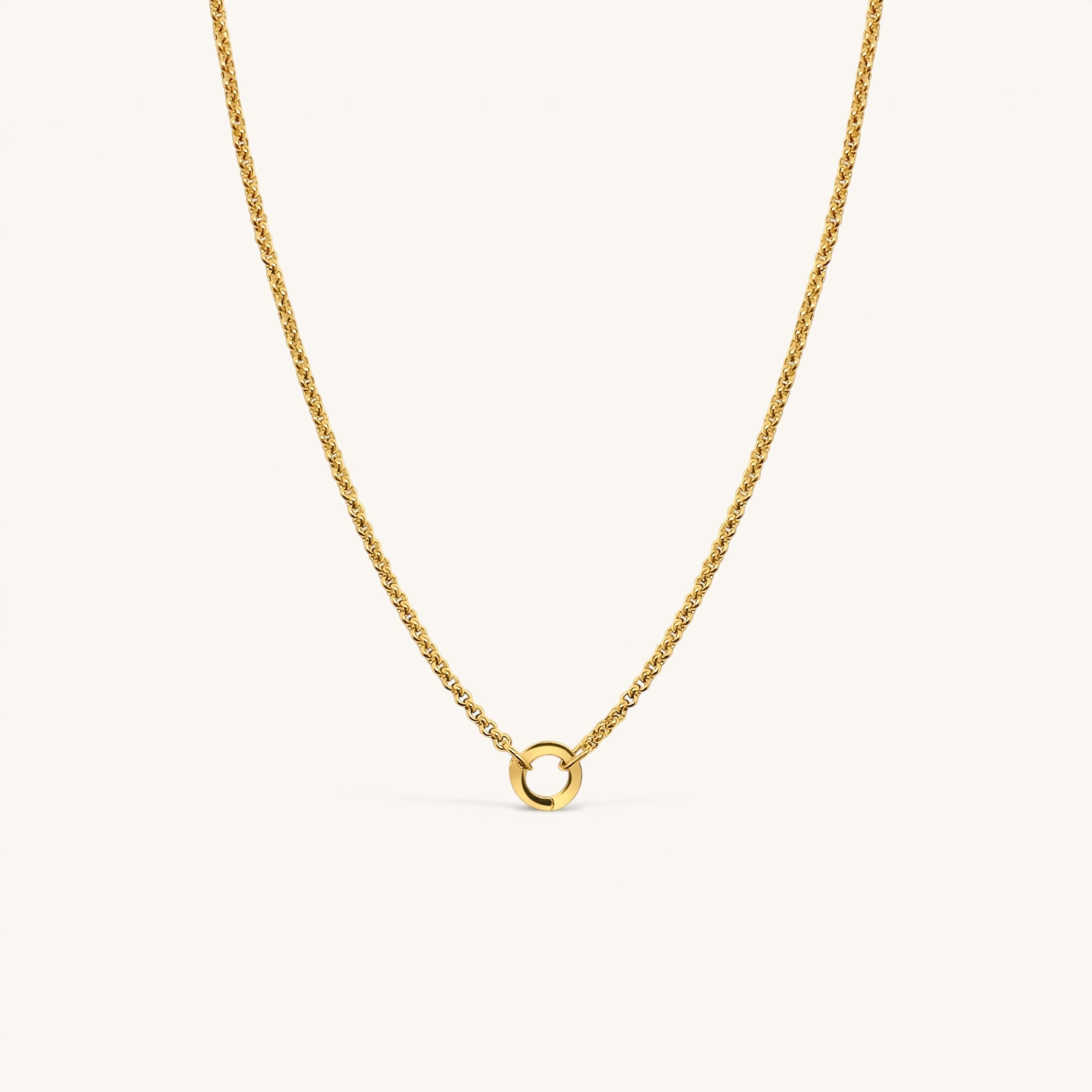 Nadare Co. gold circular switch clasp on a delicate rope chain necklace for holding charms