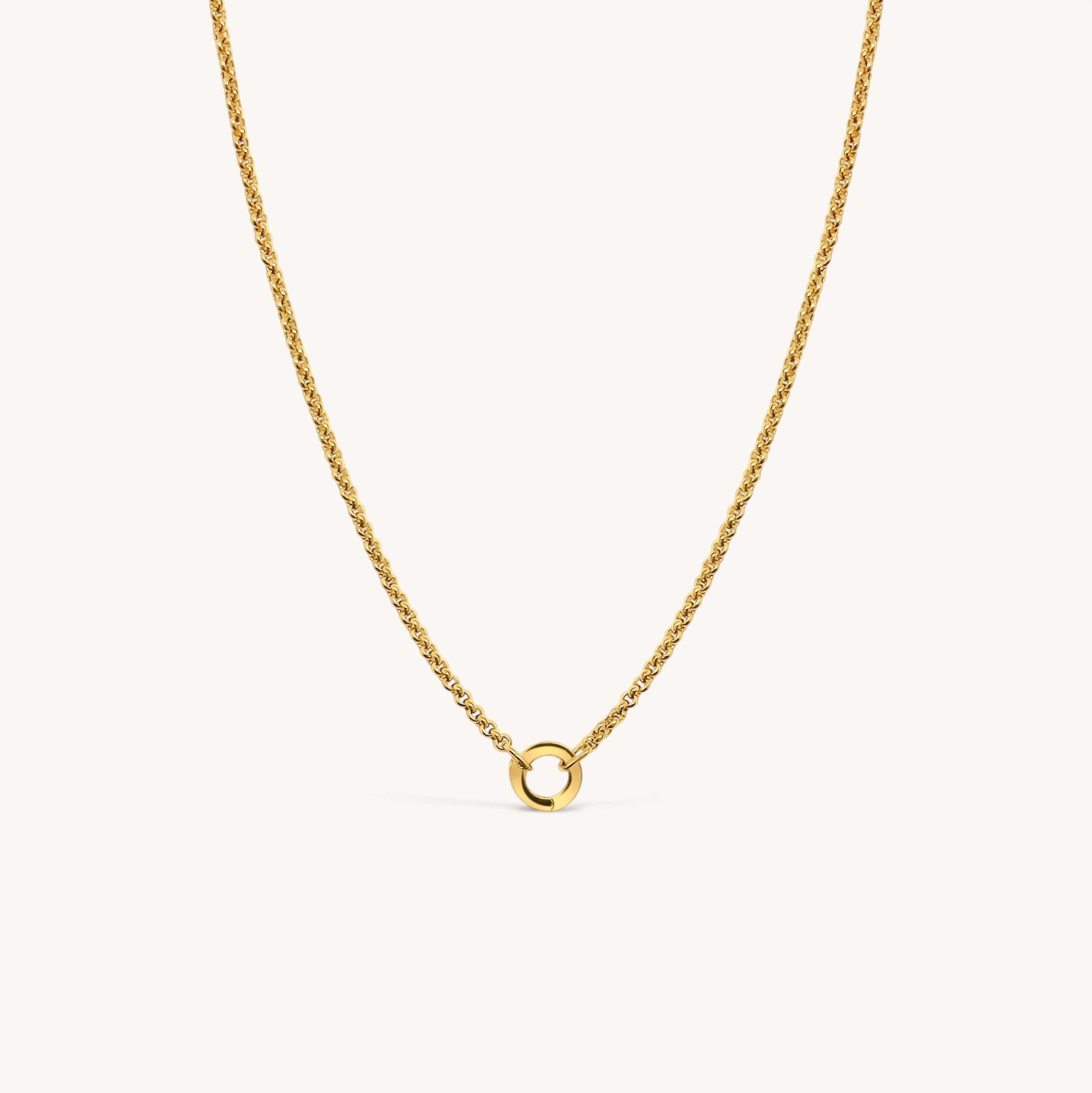 Nadare Co. gold circular switch clasp on a delicate rope chain necklace for holding charms