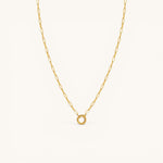 Nadare Co. gold chain necklace featuring a circular switch clasp for holding up to three charms.