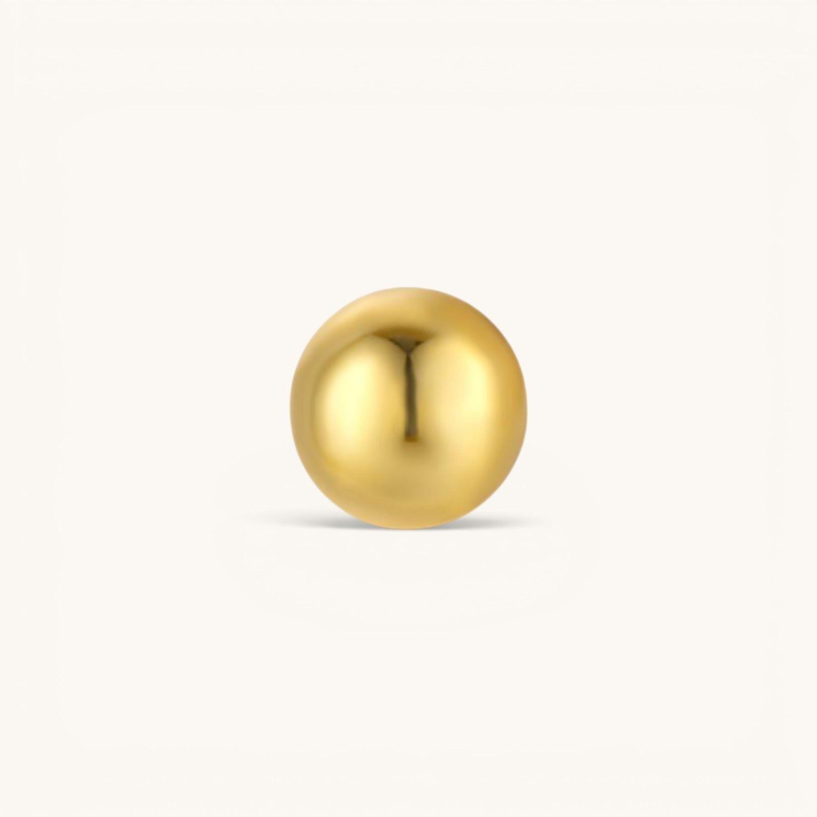 Nadare Co. Iris Threadless Front gold-plated titanium bead for minimalist piercing jewelry.