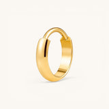 Nadare Co. Cleo Clicker Hoop in polished gold-tone titanium with a secure hinged closure for versatile piercings.