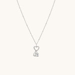 Nadare Co. silver gothic initial and birthstone necklace featuring a heart charm on a delicate beaded chain