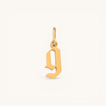Nadare Co. gold-plated stainless steel gothic letter G charm with sharp edges for a necklace stack.
