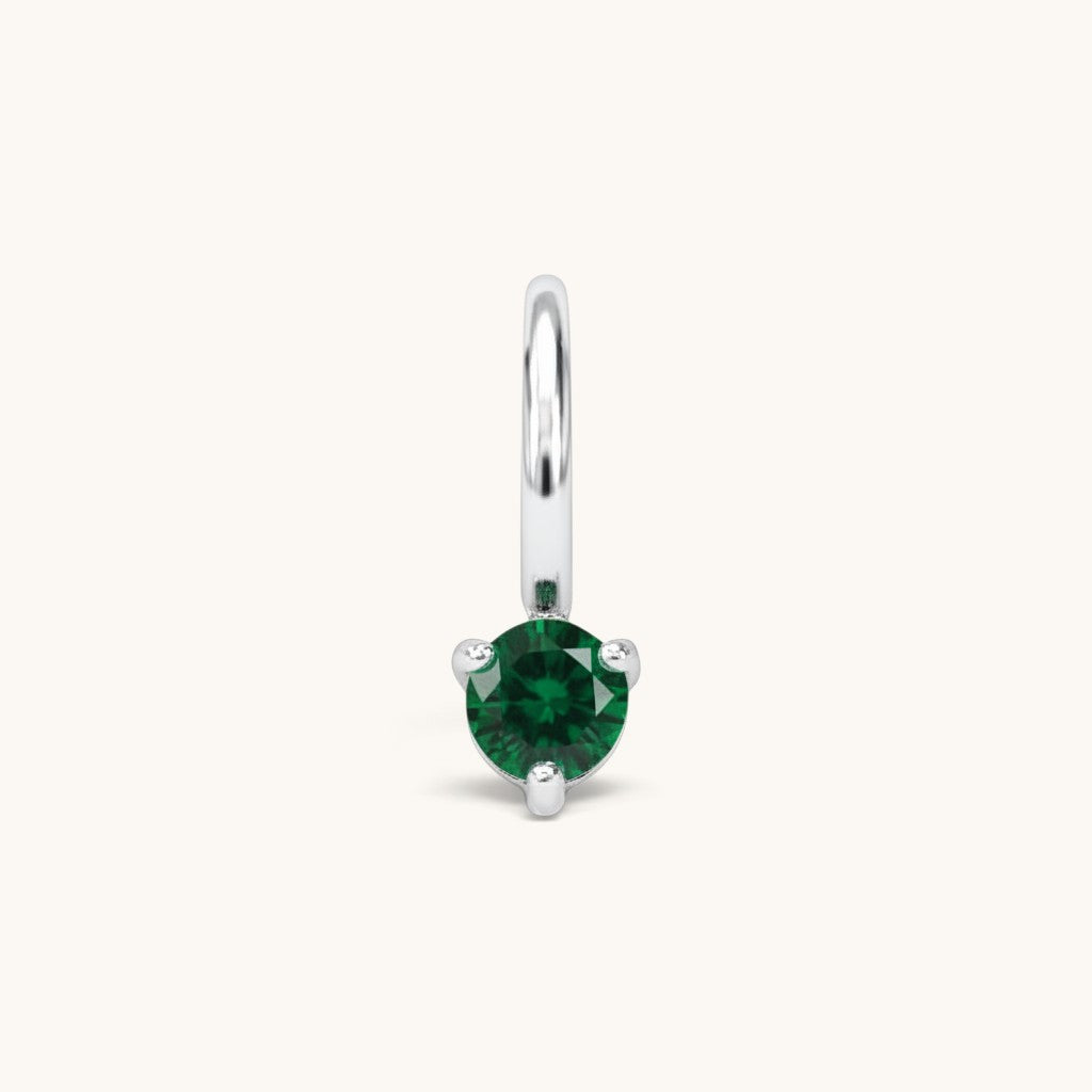 Nadare Co. mini birthstone charm featuring a round green cubic zirconia stone in a silver-tone setting