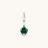Nadare Co. mini birthstone charm featuring a round green cubic zirconia stone in a silver-tone setting