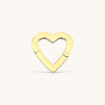 Nadare Co. gold heart-shaped switch clasp for charm necklaces with a polished finish on a neutral background.