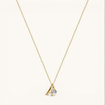 Nadare Co. gold plated dainty initial A pendant necklace with a sparkling birthstone charm for everyday wear.