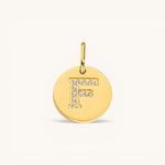 Nadare Co. gold-tone initial F charm with pavé crystal accents on a polished disc.