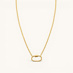 Nadare Co. gold chain necklace featuring a large oval carabiner clasp for holding charms.