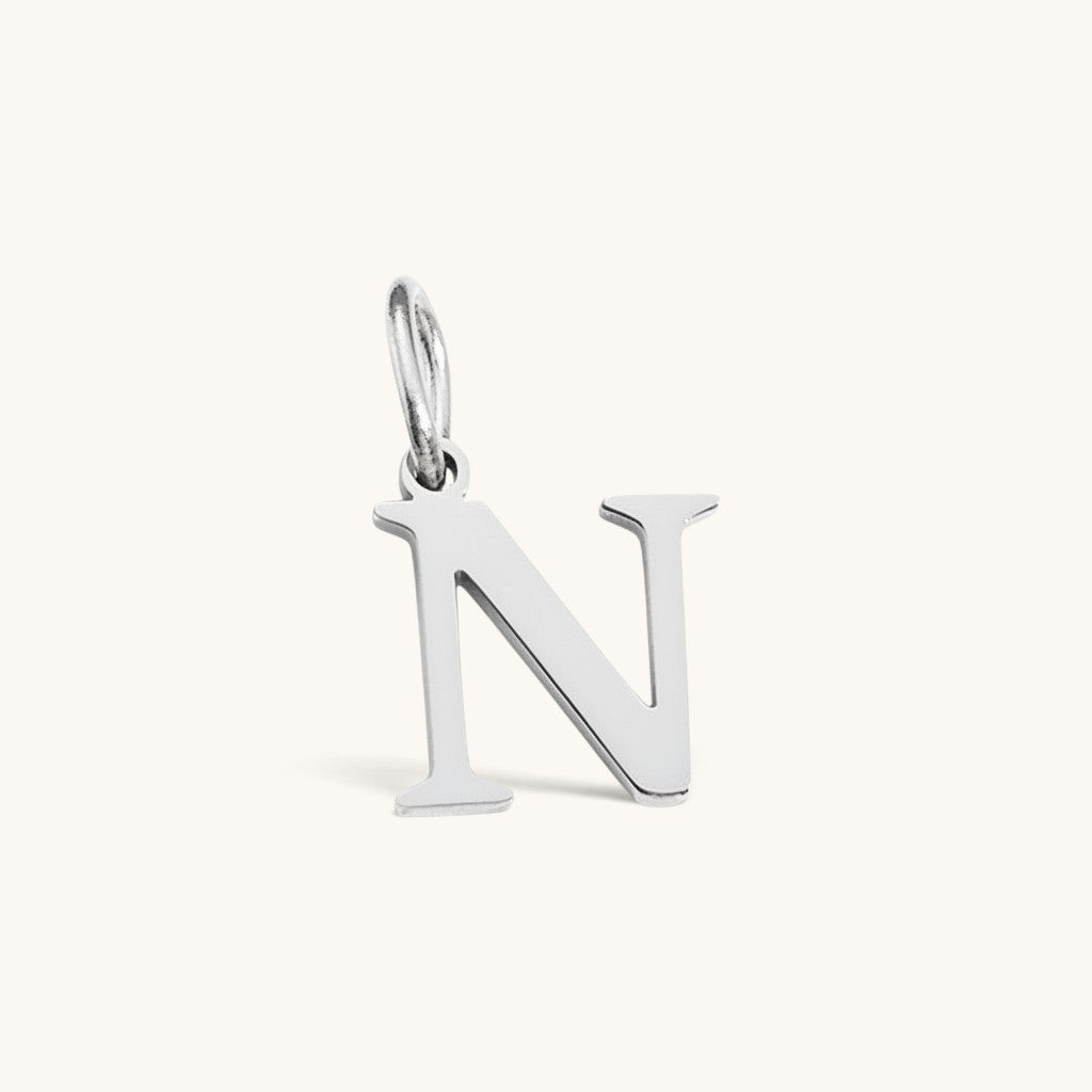 Nadare Co. silver-toned stainless steel initial charm in letter N with a clean serif font design.