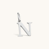 Nadare Co. silver-toned stainless steel initial charm in letter N with a clean serif font design.