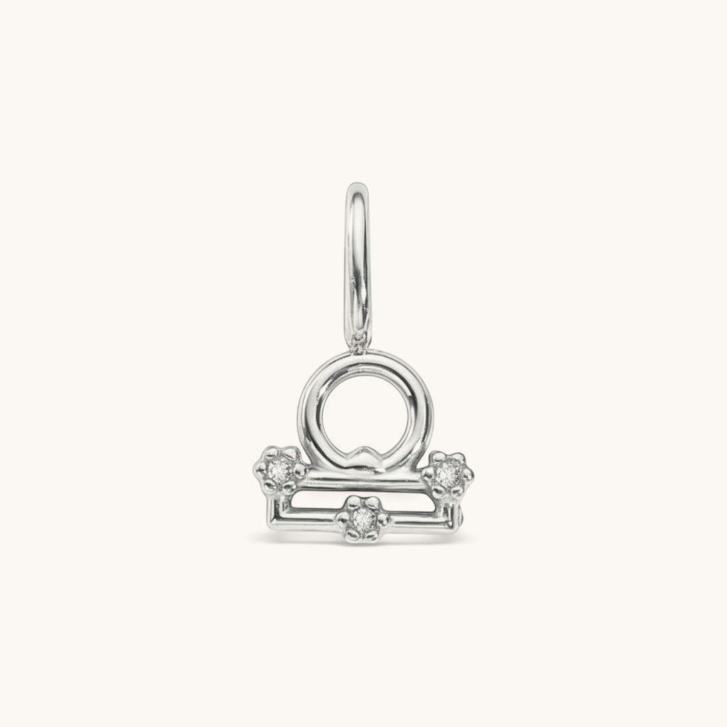 Nadare Co. silver-toned Libra zodiac charm with cubic zirconia accents for necklace layering