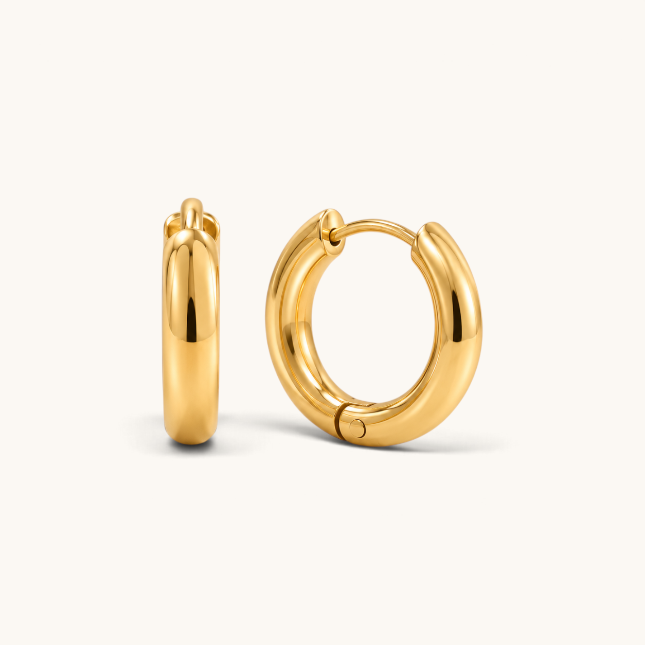 Nadare Co. Lola Hoops in polished gold stainless steel, featuring a classic rounded everyday design.