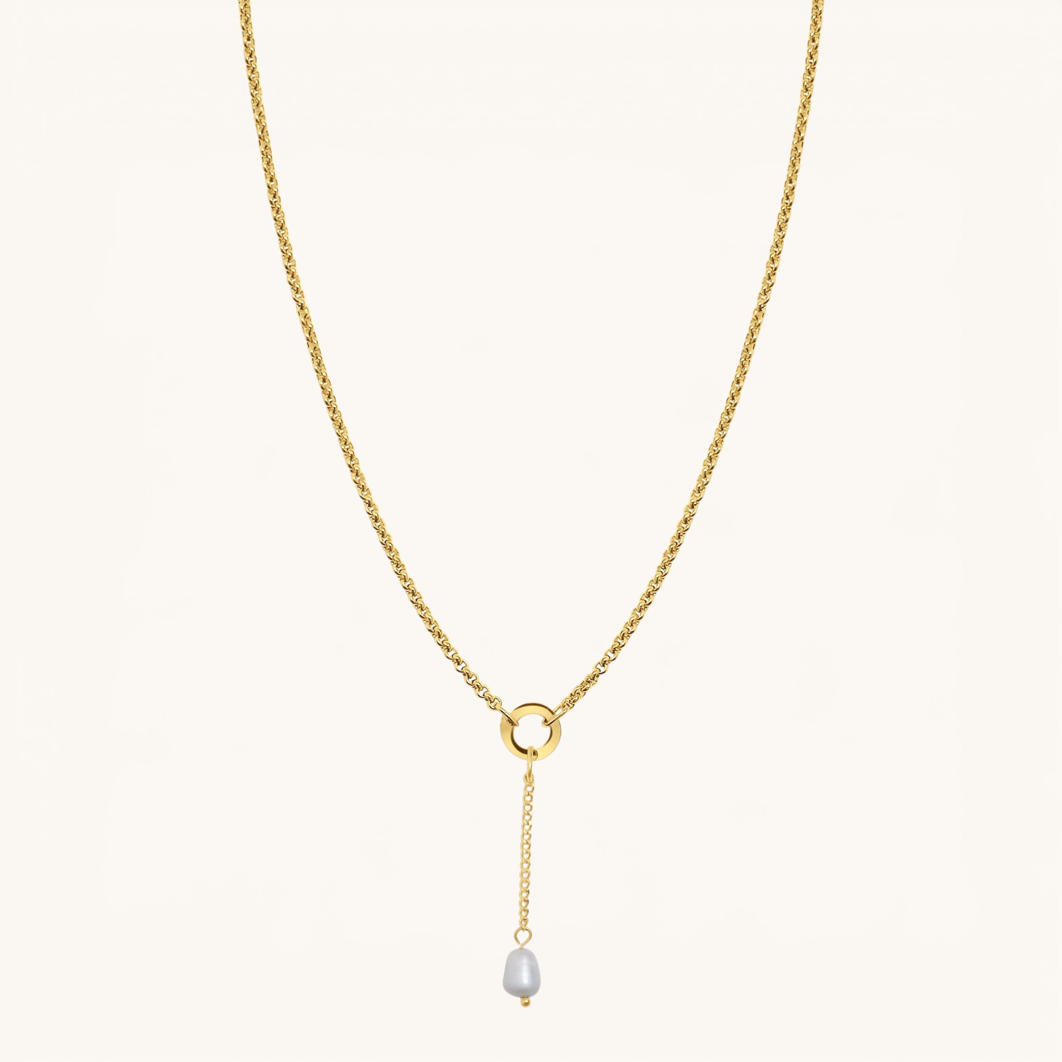 Nadare Co. long pearl drop charm on a gold chain necklace featuring a genuine freshwater pearl and 14k gold plating.