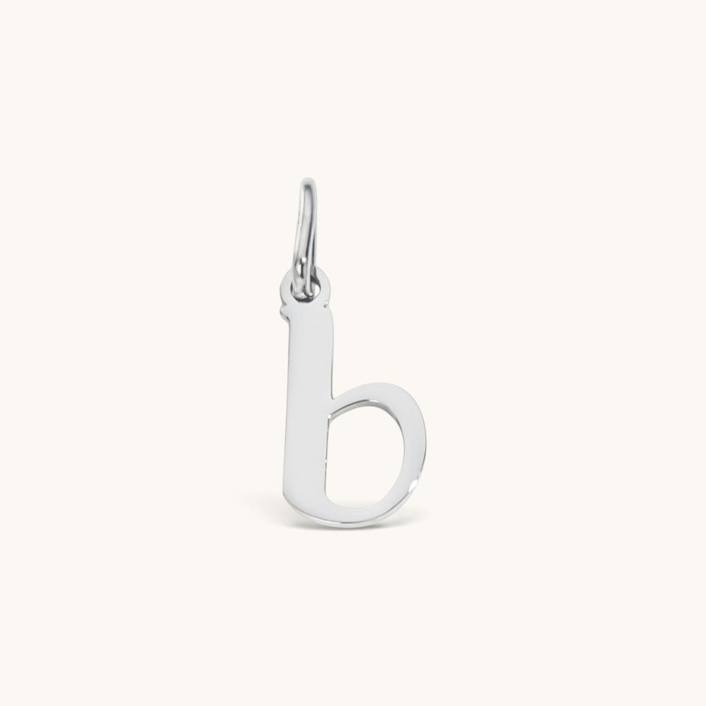 Nadare Co. silver-toned lowercase letter b charm made from durable stainless steel for everyday jewelry layering