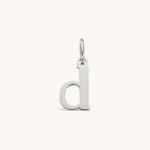 Nadare Co. silver-toned lowercase letter d charm made of durable stainless steel for everyday jewelry layering