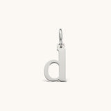 Nadare Co. silver-toned lowercase letter d charm made of durable stainless steel for everyday jewelry layering