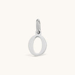 Nadare Co. silver-tone lowercase letter O charm made of durable stainless steel for everyday jewelry layering.