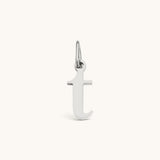 Nadare Co. lowercase letter t charm in silver-toned stainless steel for everyday layering and jewelry styling.