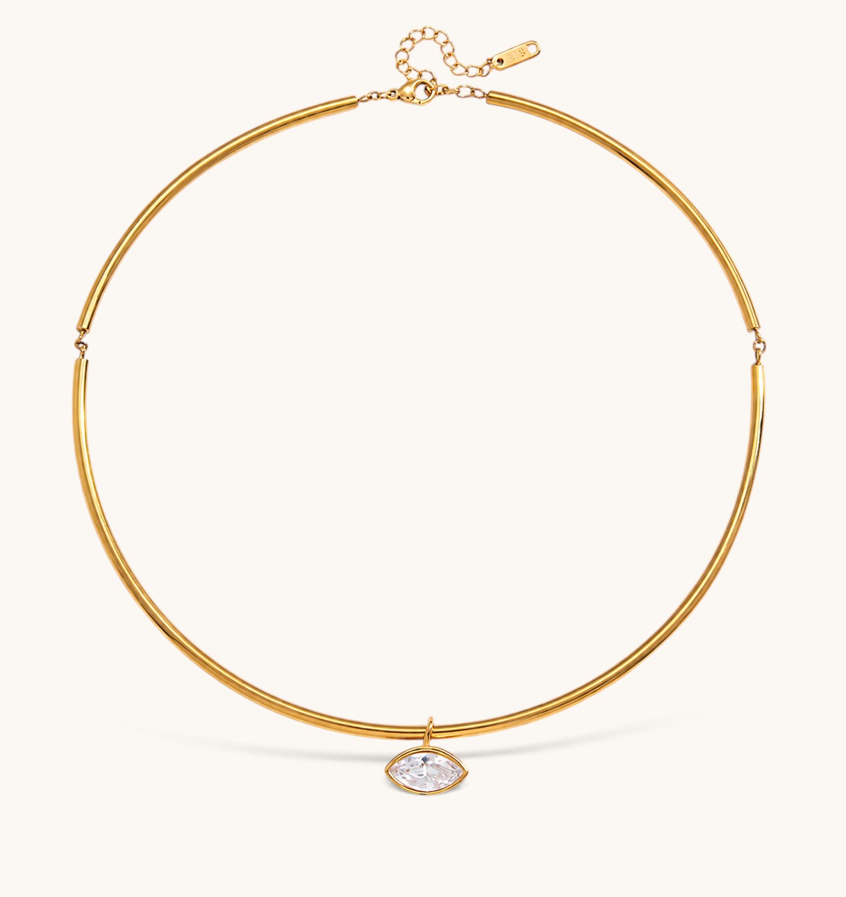 Nadare Co. Margot gold collar necklace with a sleek chain and a single marquise-cut bezel-set crystal pendant.