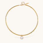 Nadare Co. Margot gold collar necklace featuring a sleek polished chain and a single sparkling bezel-set crystal.