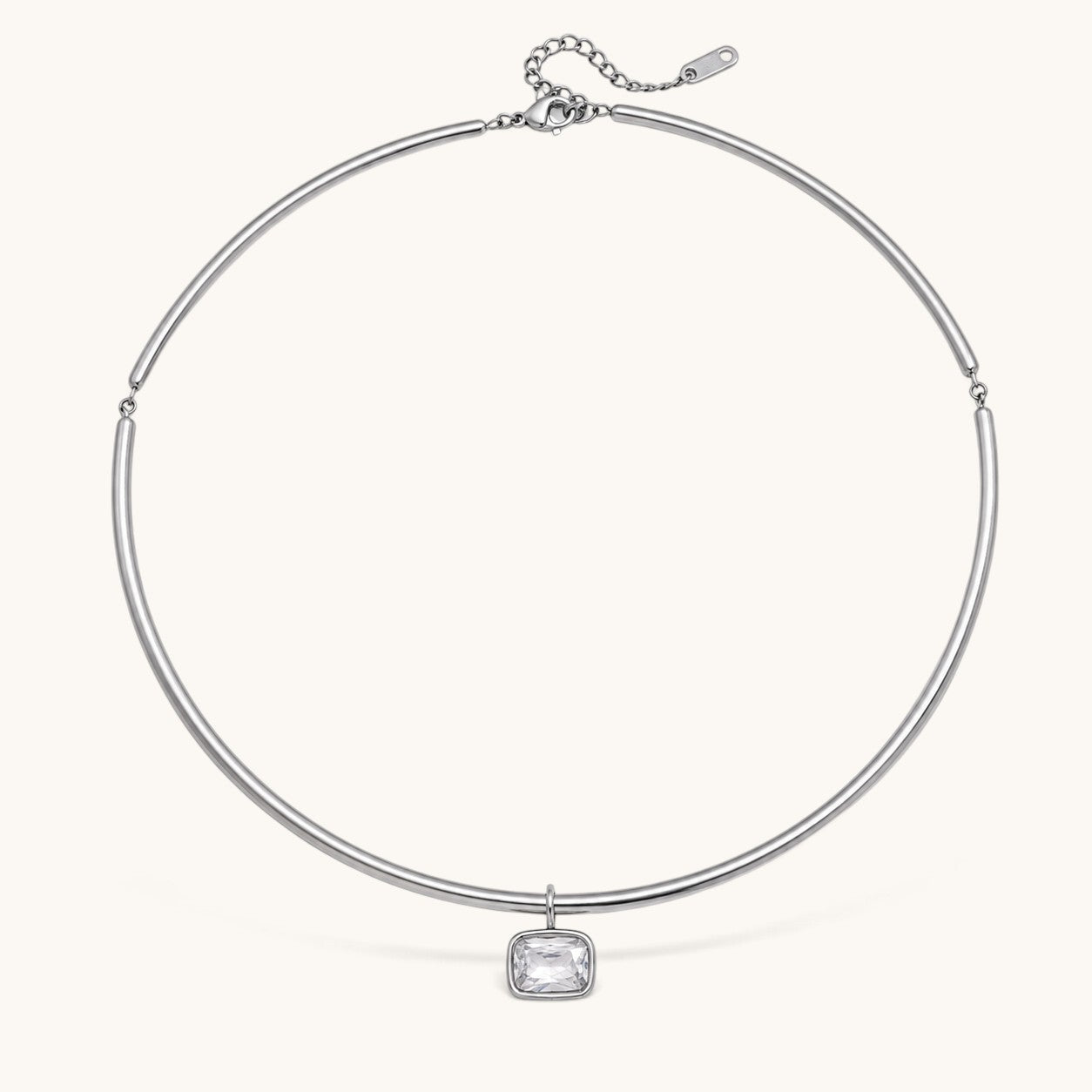 Nadare Co. Margot silver collar necklace with a polished chain and a single rectangular bezel-set crystal pendant.