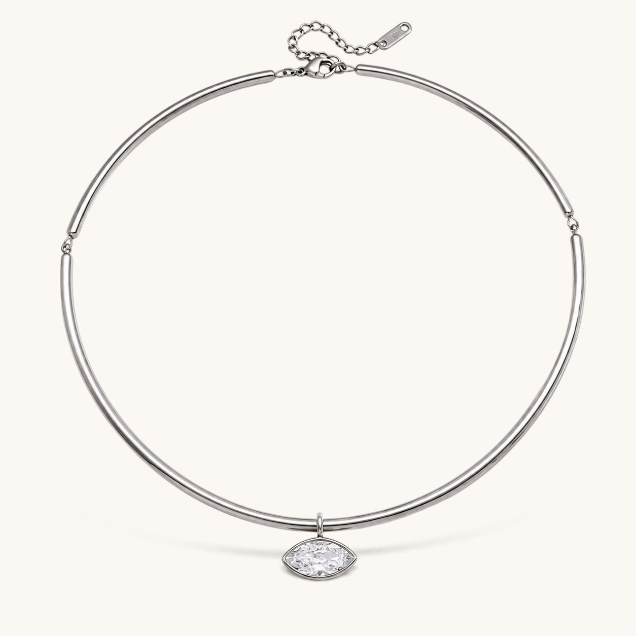 Nadare Co. Margot silver collar necklace with a sleek chain and a sparkling marquise-cut bezel-set crystal pendant.