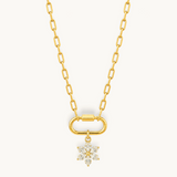 Nadare Co. gold-plated flower charm necklace with marquise-cut cubic zirconia petals on a chunky link chain.