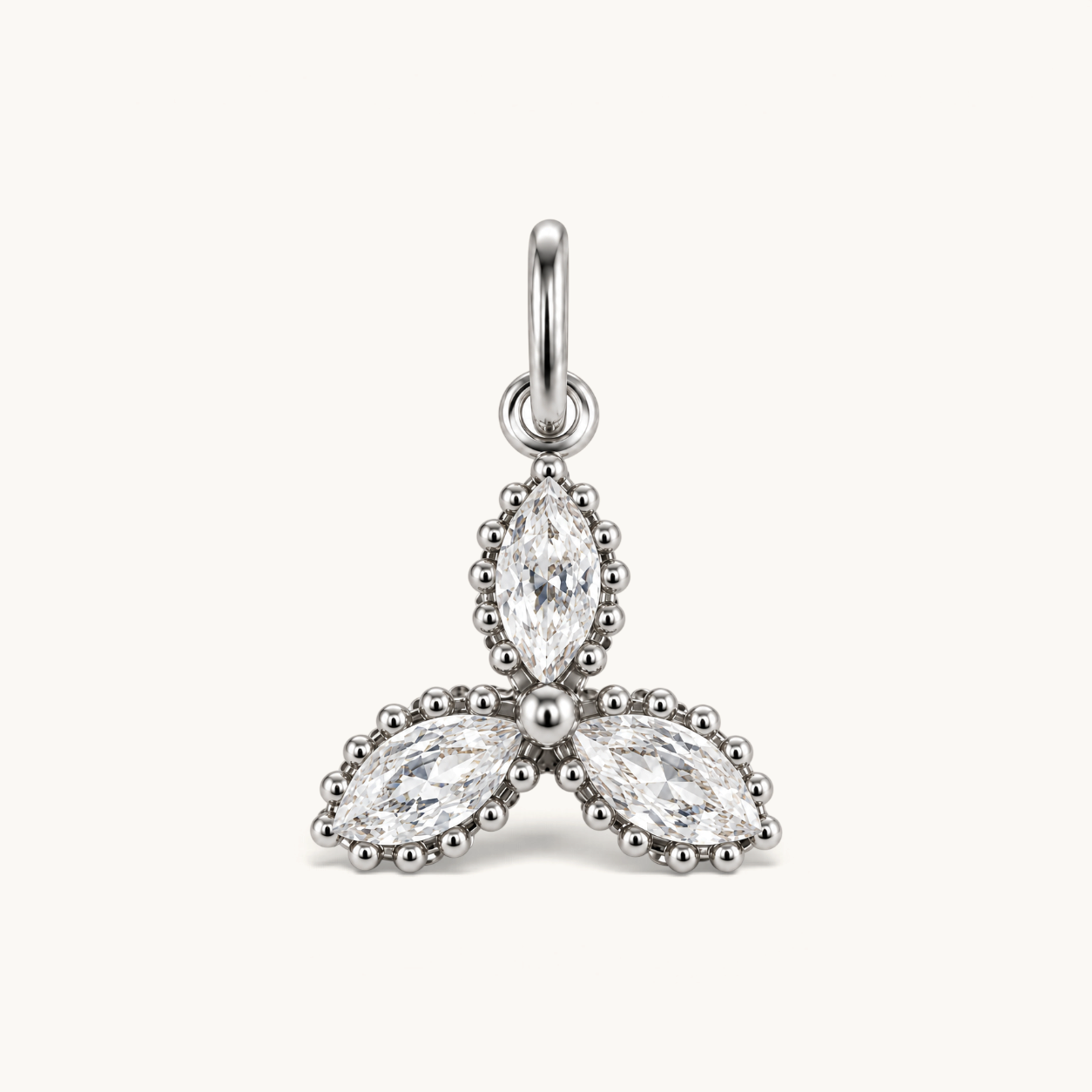 Nadare Co. Marquise Trio Charm featuring three marquise-cut cubic zirconia stones in a delicate petal arrangement.