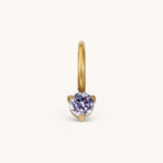 Nadare Co. mini birthstone charm featuring a round lavender gemstone set in polished gold on a small hoop.