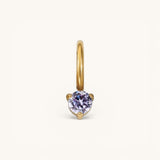 Nadare Co. mini birthstone charm featuring a round lavender gemstone set in polished gold on a small hoop.